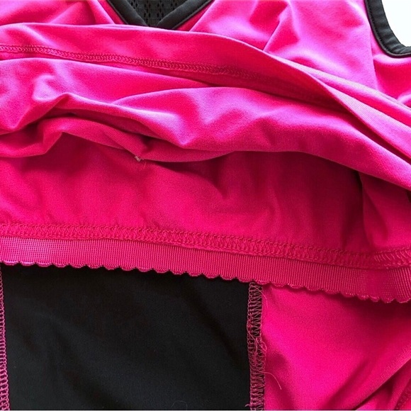 Fila Bright Pink and Black Racerback Workout Top
•Size Medium - Picture 5 of 11